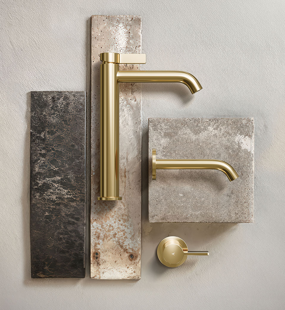Artize Aura brushed gold faucet on natural stone — texture, precision, calm