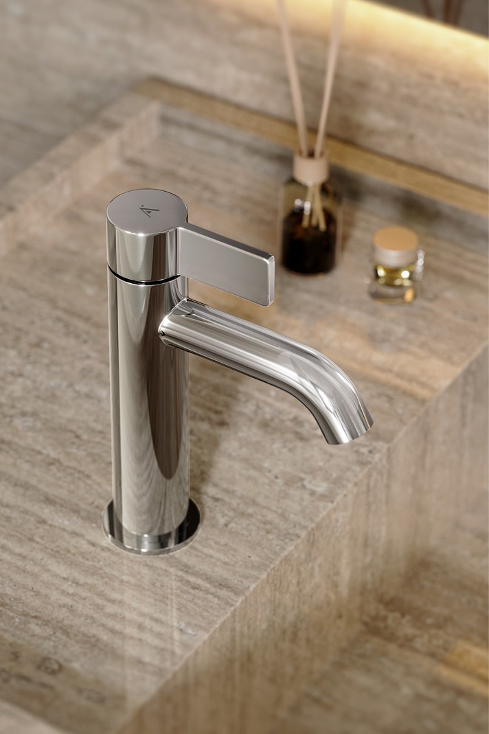 Artize chrome faucet on travertine — Colour in Art finish